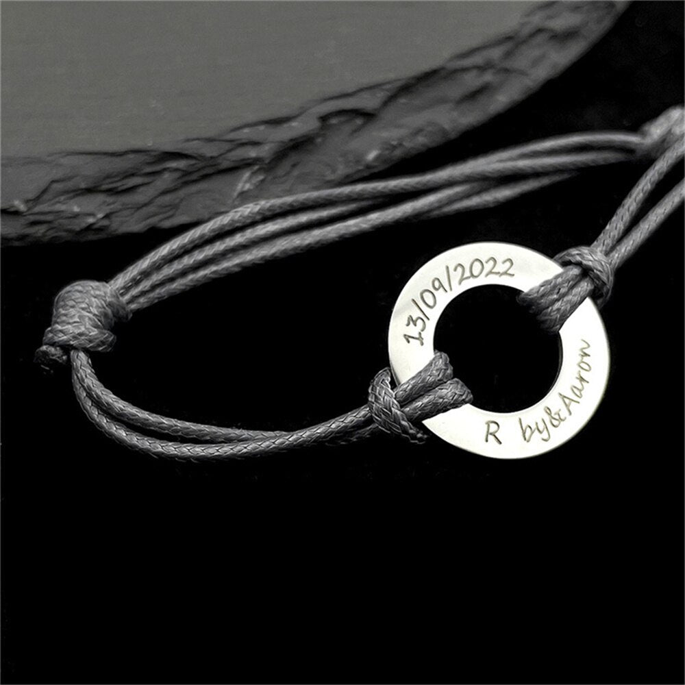Rope Bracelet with Engraved Round Amulet