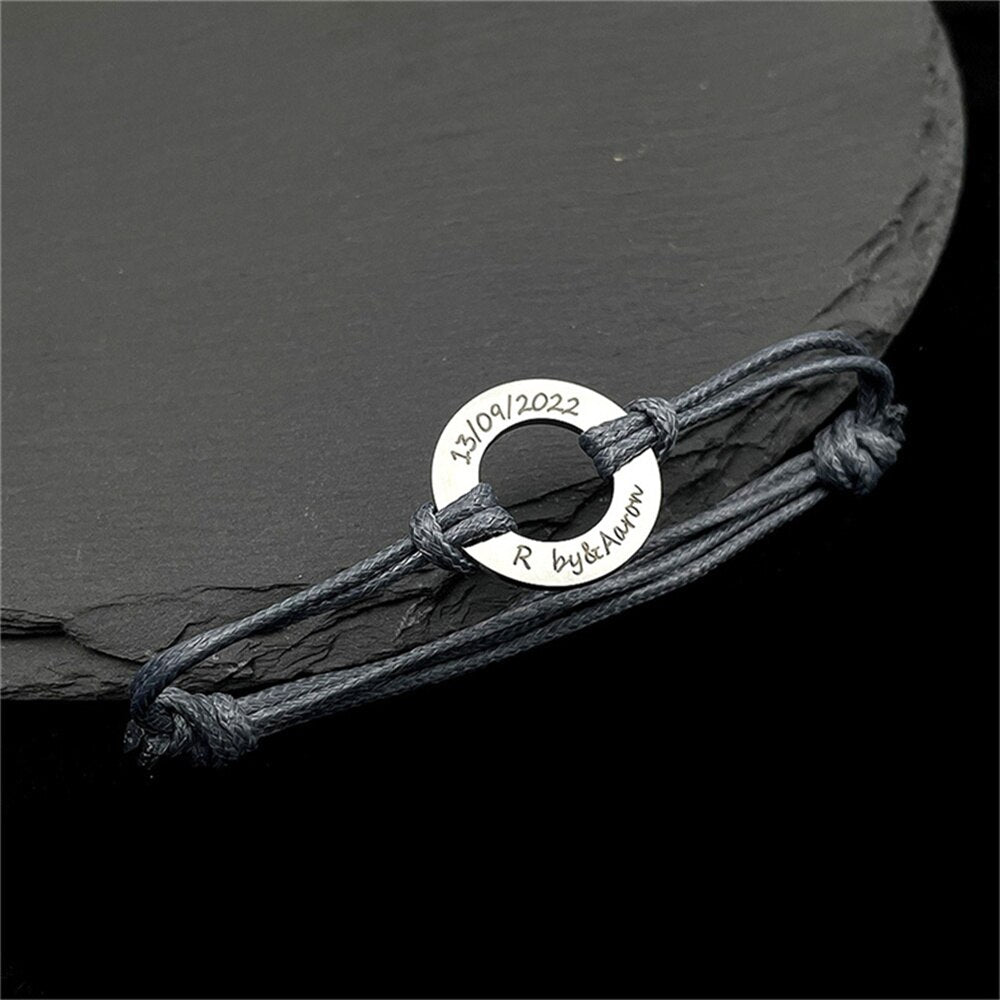 Rope Bracelet with Engraved Round Amulet